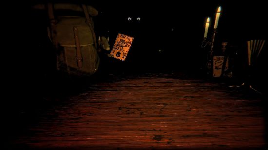 Best story games - across from a table are some piercing eyes, a rucksack with a rat behind it holding a card, and some items next to a candlestick.
